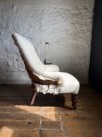 A 19th Century Buttoned Back Bedroom Chair with Turned Legs and Original Castors - Image 3