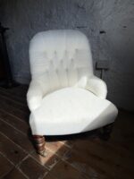 A 19th Century Buttoned Back Bedroom Chair with Turned Legs and Original Castors - Image 2
